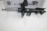 Стойка Hyundai Accent III Kia Rio II перед. прав. газомасл. (TRIALLI)