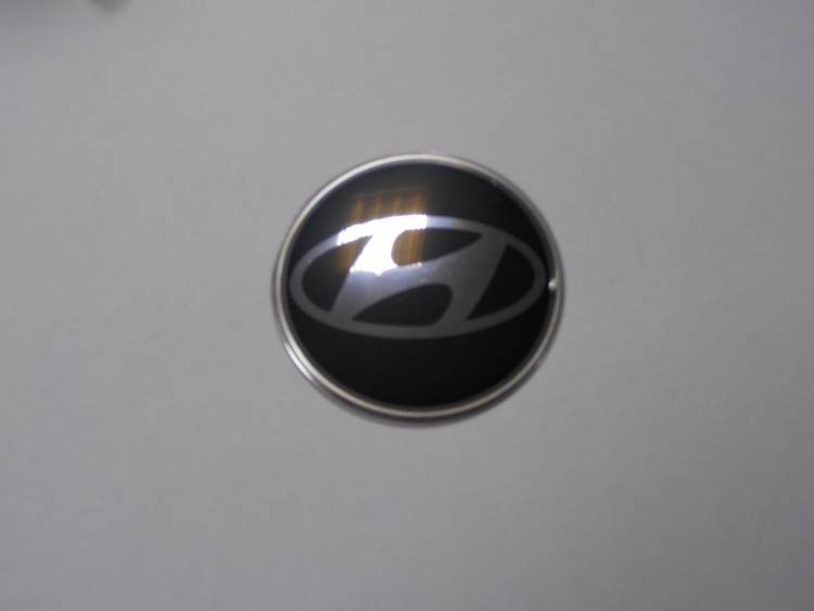 Наклейка "HYUNDAI" на автомобильные колпаки, диски (диаметр 55мм.) компл. 4шт.