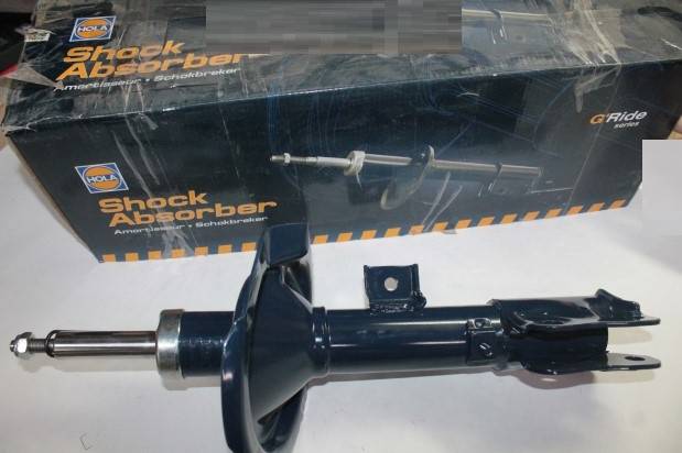 Стойка Mitsubishi Lancer перед. лев. газомасл. (HOLA)